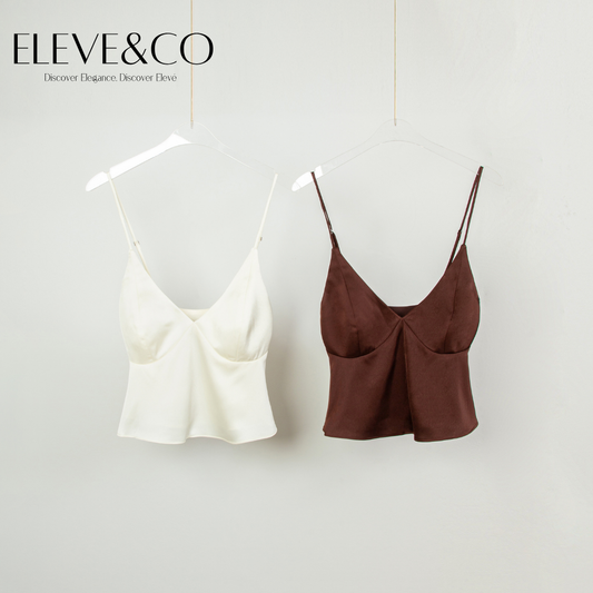 Two camisoles, one white and one brown, hanging on a white background with 'Eleve&Co' branding.
